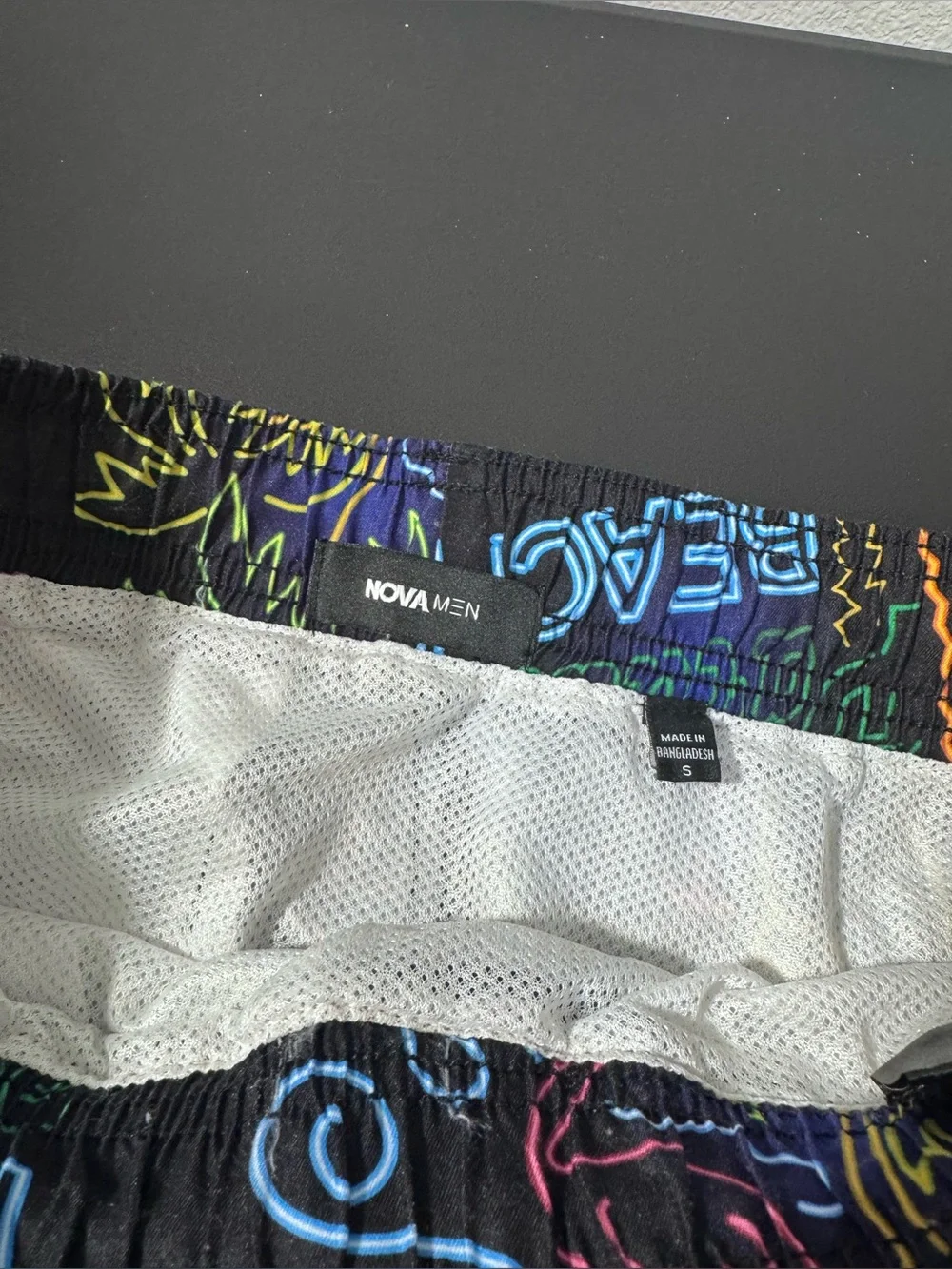 Fashion Nova Black Neon Graphic Swim Trunks